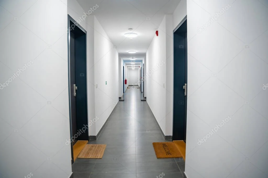 Modern apartment building lobby with access control system